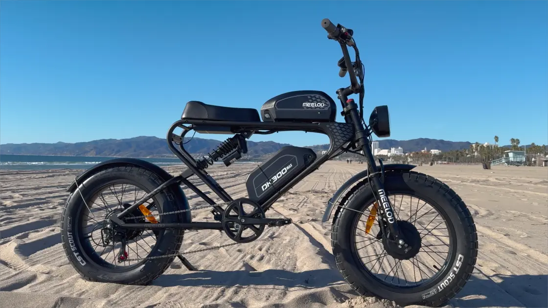 Dual motor e-bike with fat tires on an off-road trail