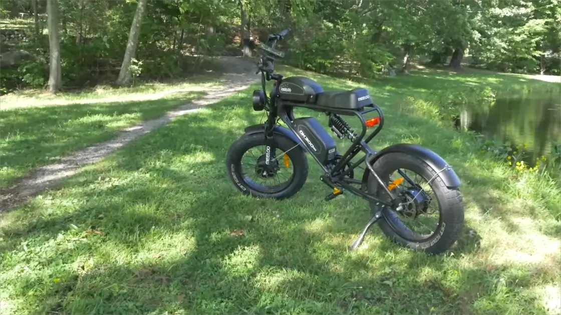 eBike rider planning a 100-mile route with a map