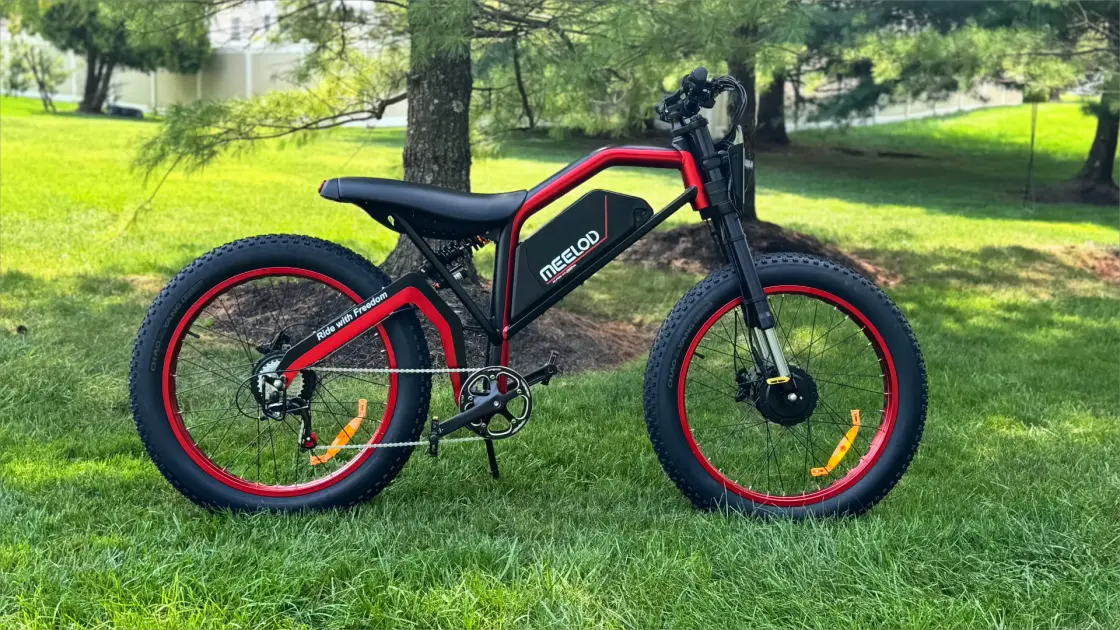 fat tire e-bike on beach trail with wide sand tires