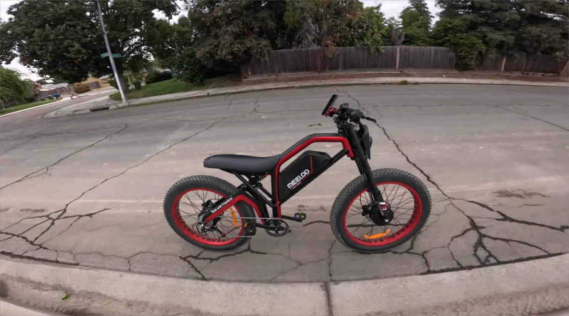 Fat tire e-bike parked on a city street for commuting