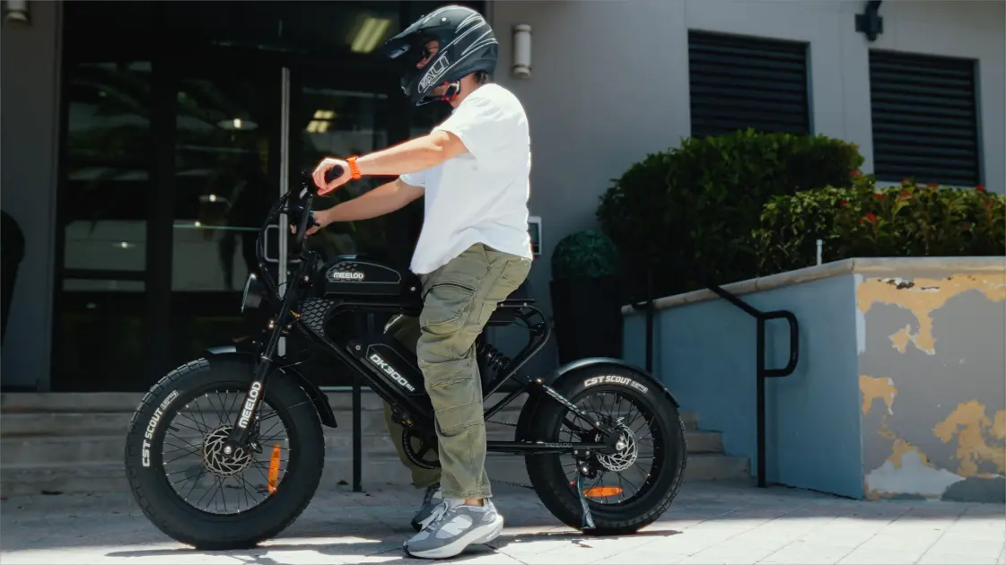 ebike locked with u-lock and chain on city bike rack